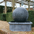 Leaf Ball fountain in an octagonal basin