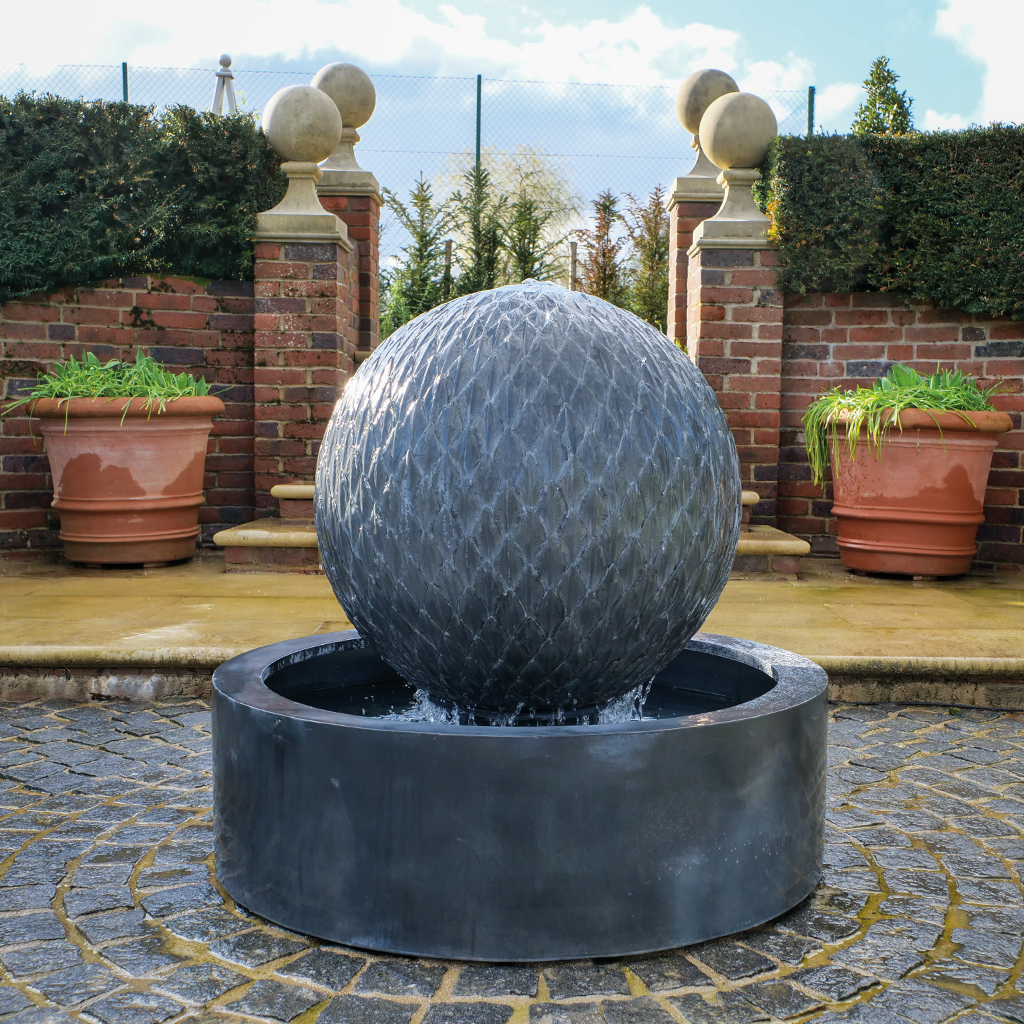 Leaf Ball fountain in a round bowl