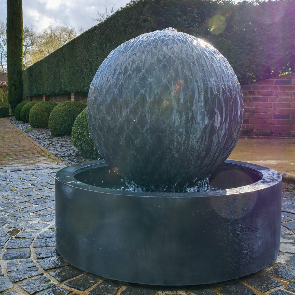 Leaf Ball fountain in a round bowl