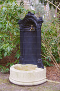 Wall-mounted cast iron tap